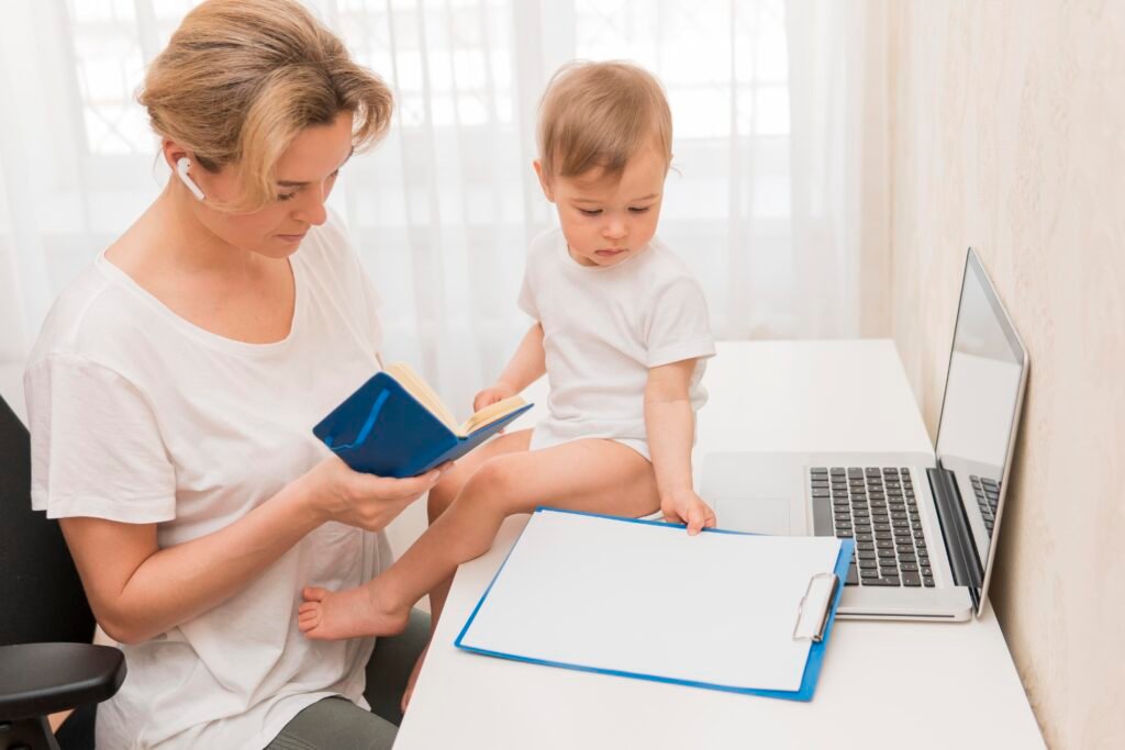 high angle mother looking agenda baby desk